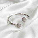 BRACELETE SEMI ABERTO ESFERAS CRAVEJADO RÓDIO BRANCO